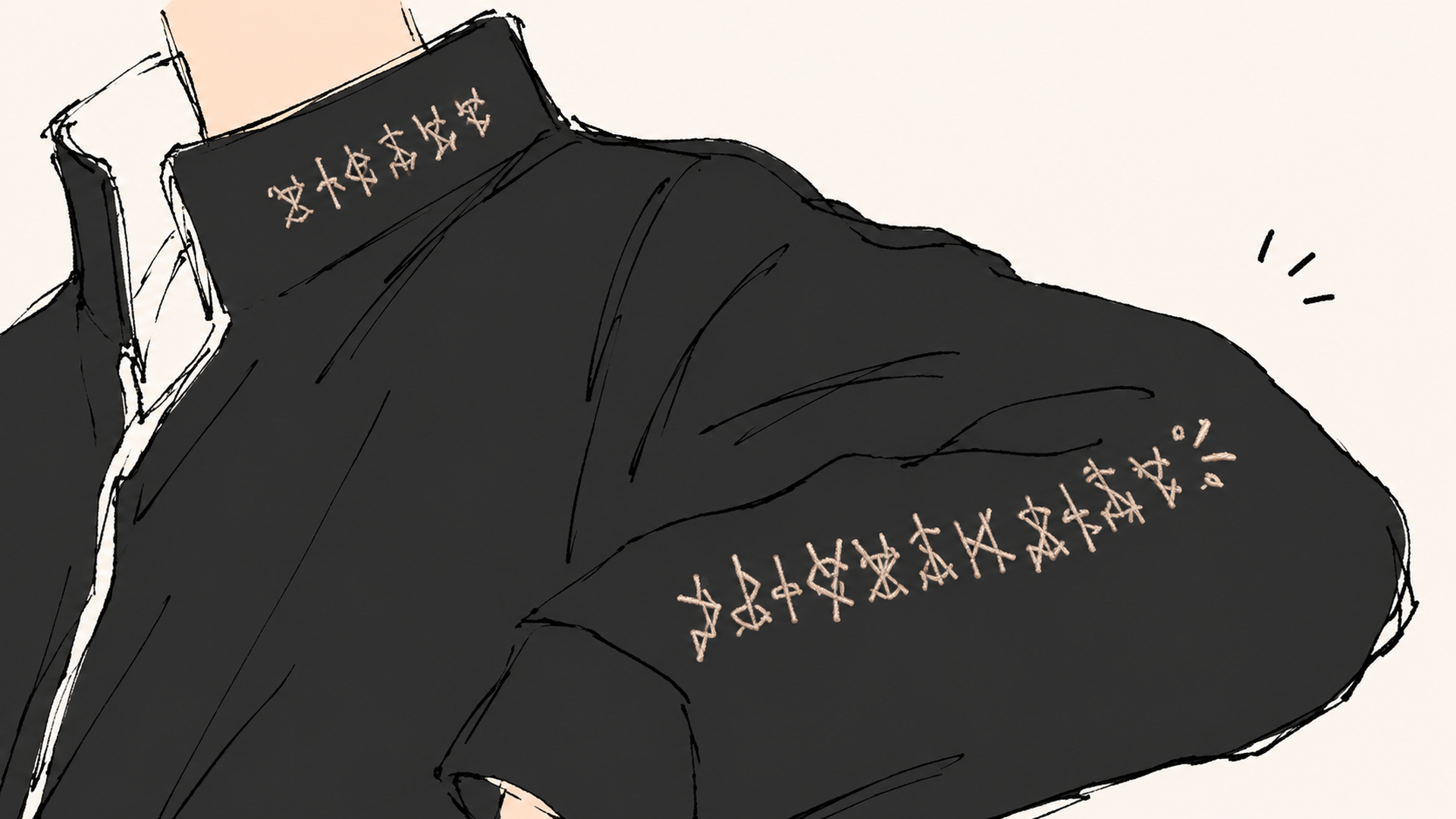 見慣れない文字が刺繍された黒いジャケットの袖と襟のクローズアップ